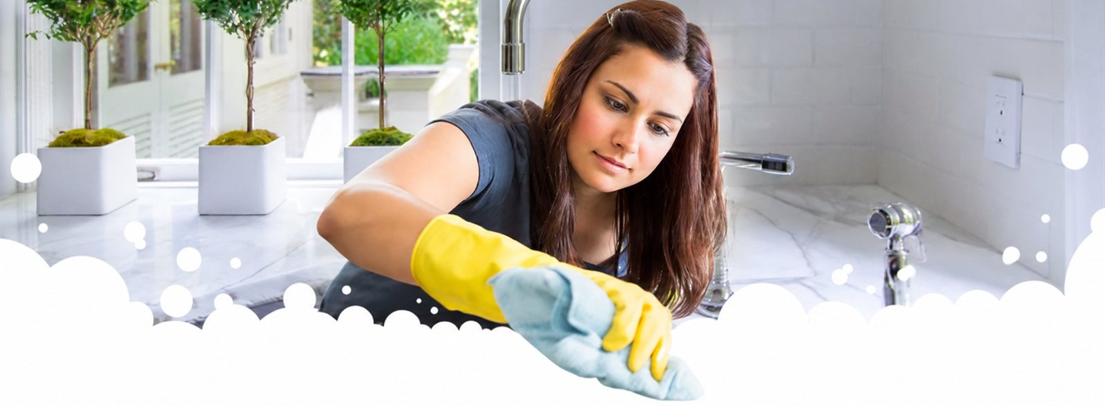 Professional cleaner wiping a countertop